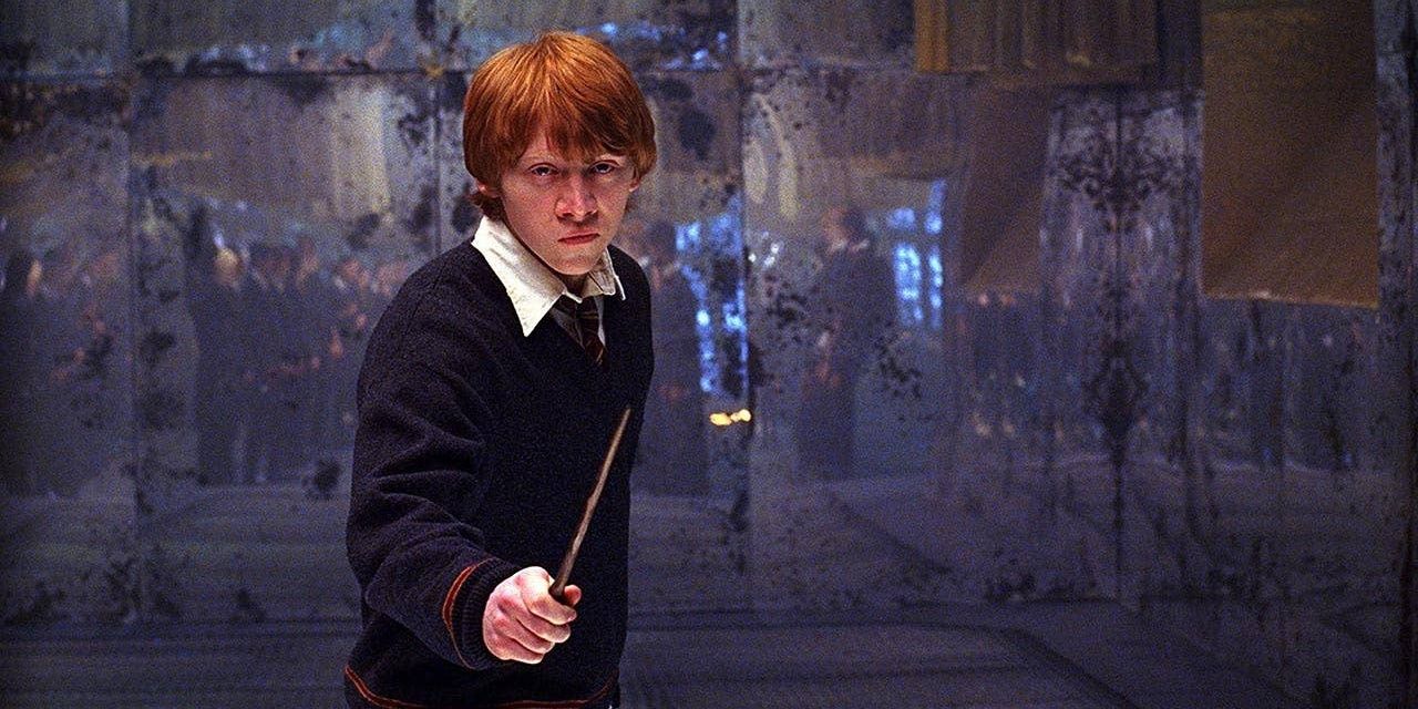 Ron Weasley raising his wand in Dumbledore's Army