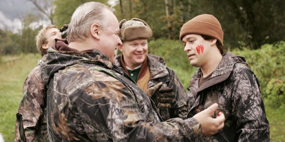 George hunting with his family.