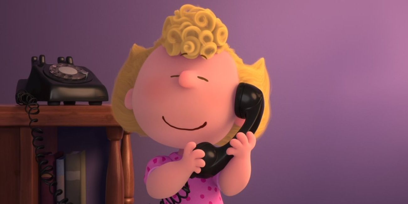 Sally smiling while talking on the phone