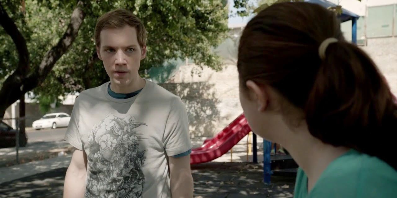 Matty looks at Debbie in anger at a playground in Shameless