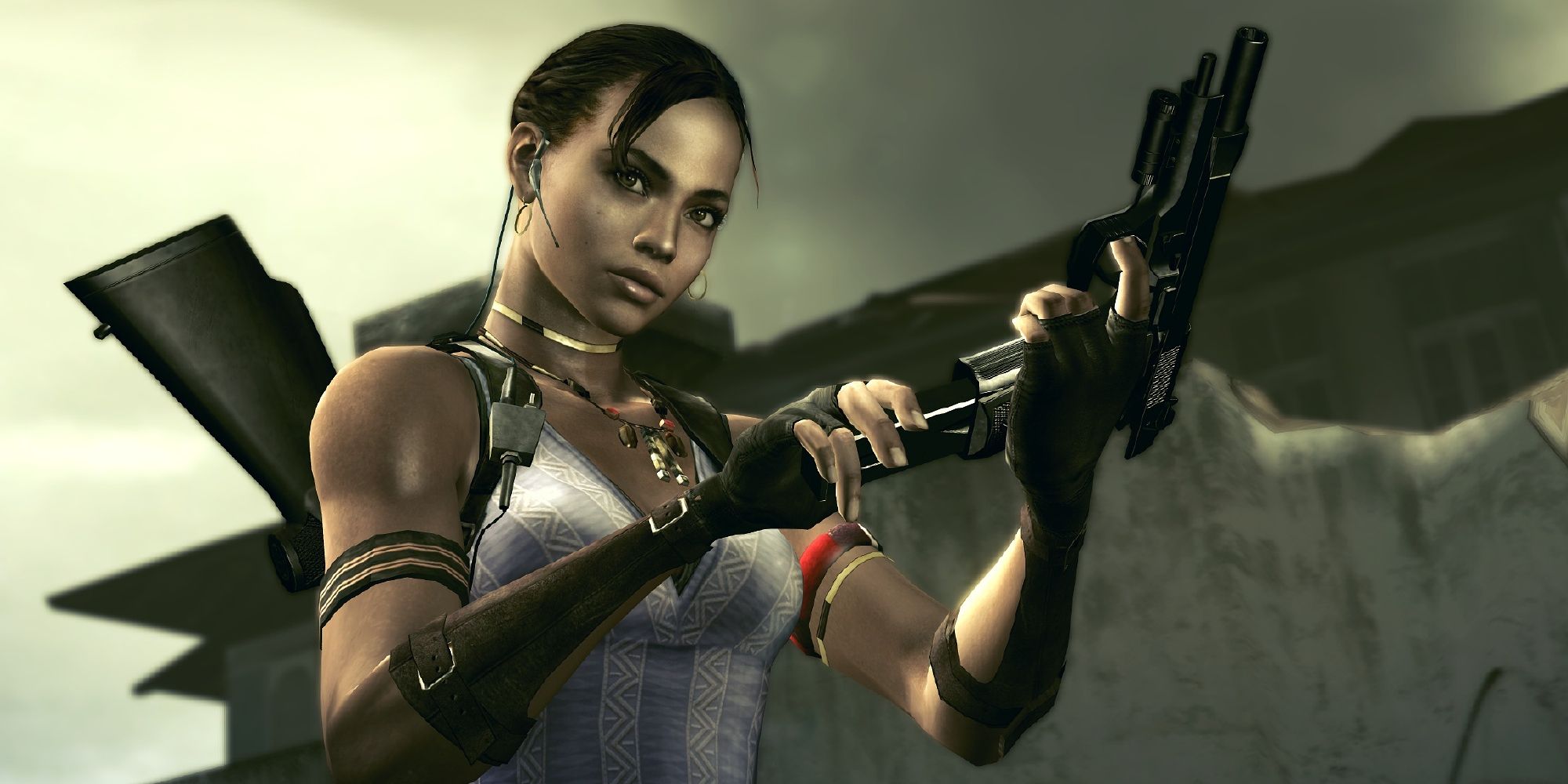 Sheva Alomar reloading her pistol in Resident Evil 5