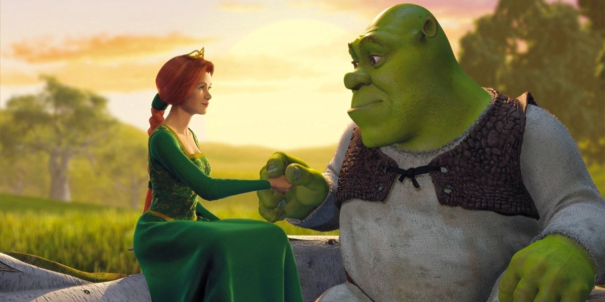 Shrek e Fiona de mãos dadas ao pôr do sol em Shrek 