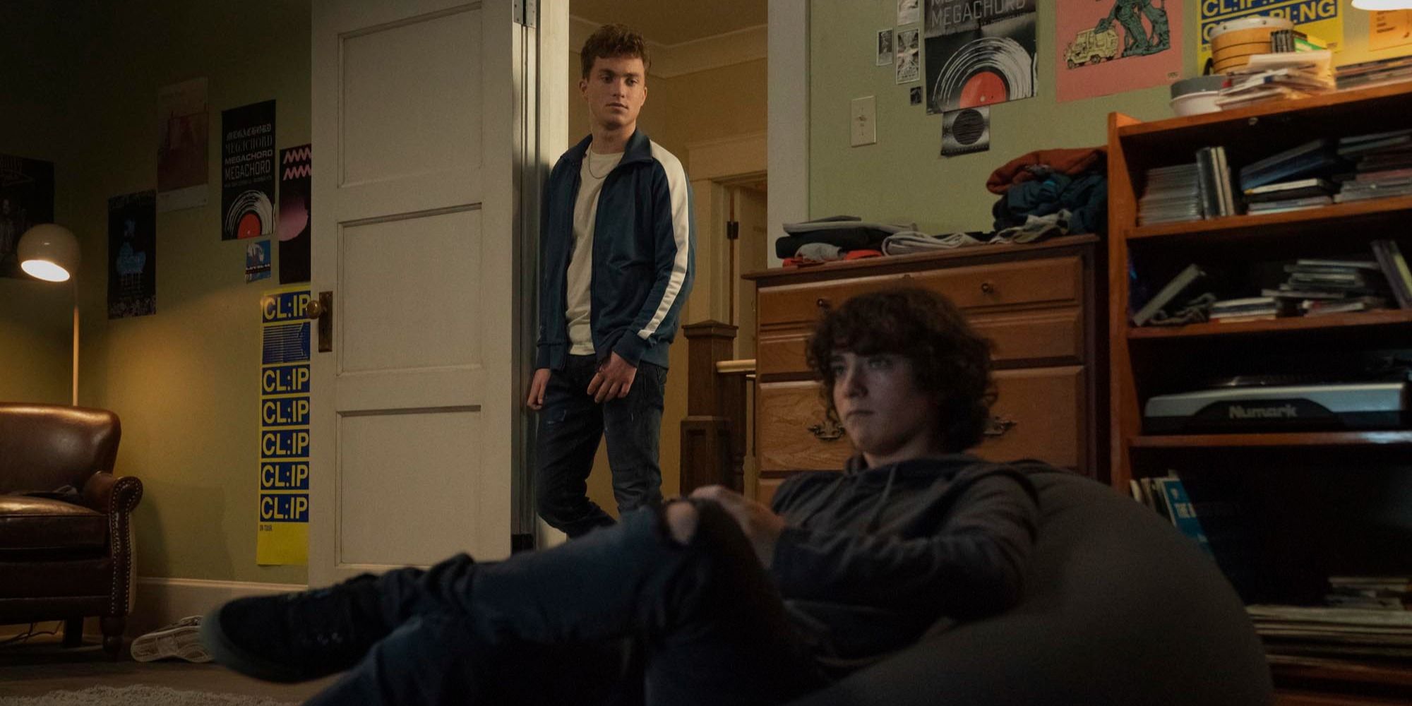 Jonathan trying to talk to Jordan who is playing video games.