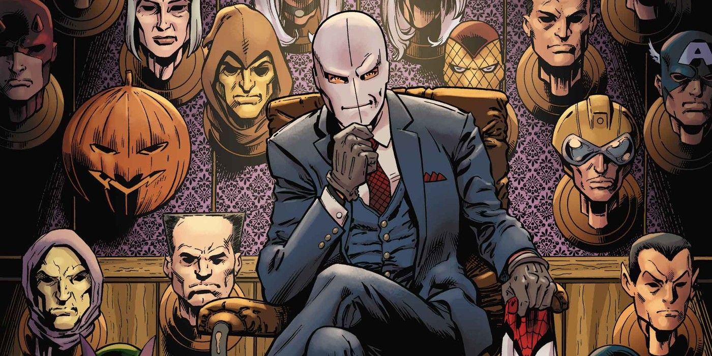 The Chameleon sitting on a chair surrounded by masks in the comics