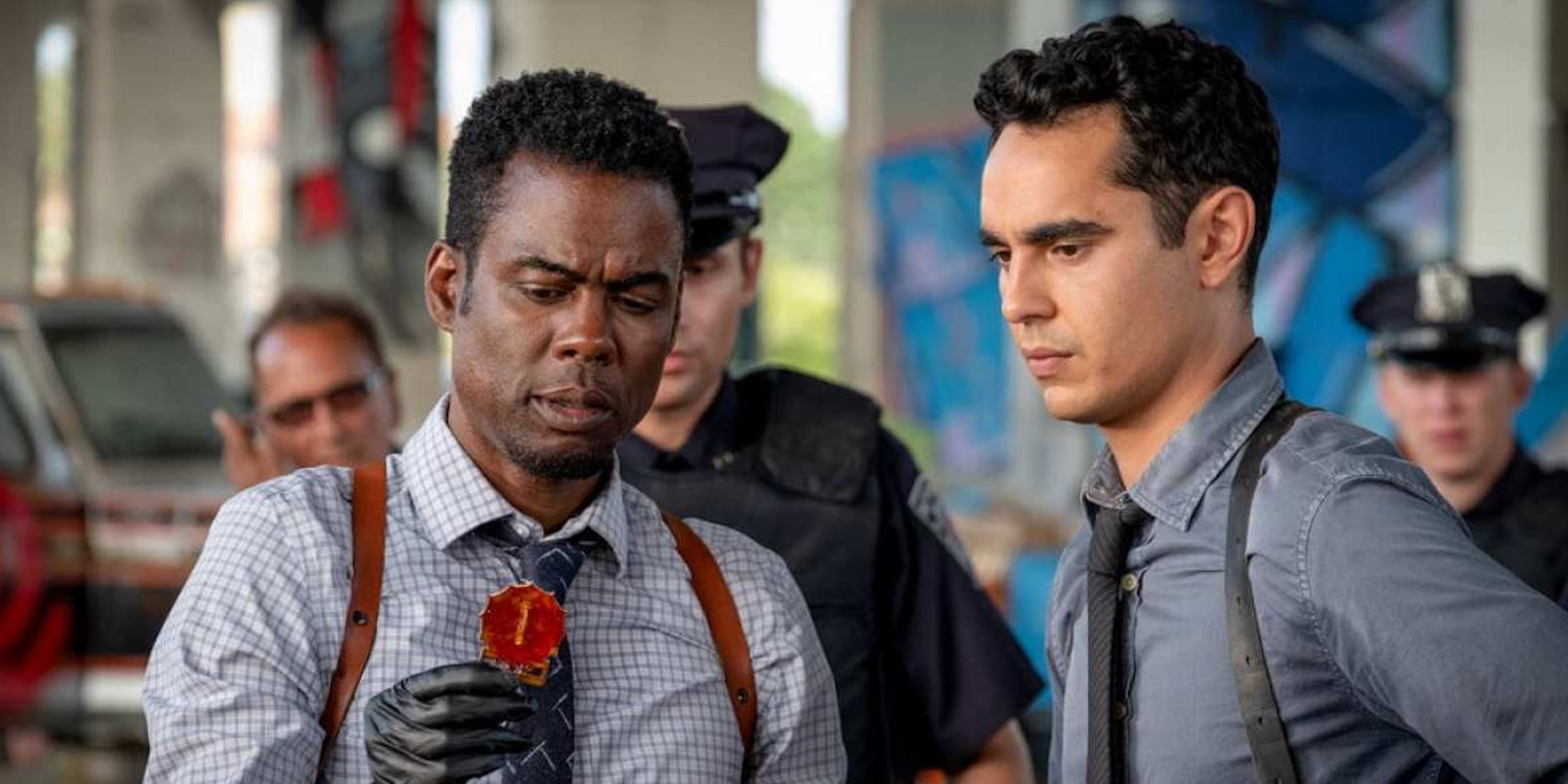 Chris Rock as Ezekiel &quot;Zeke&quot; Banks and Max Minghella as William Schenk in Spiral: From the Book of Saw