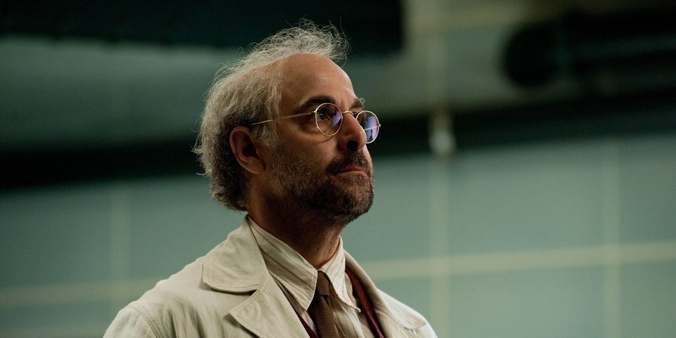 Stanley Tucci as Abraham Erskine, standing in a lab coat in Captain America