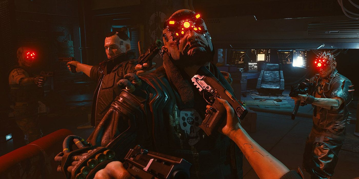 V e Jackie apontando armas para membros de gangue em Cyberpunk 2077
