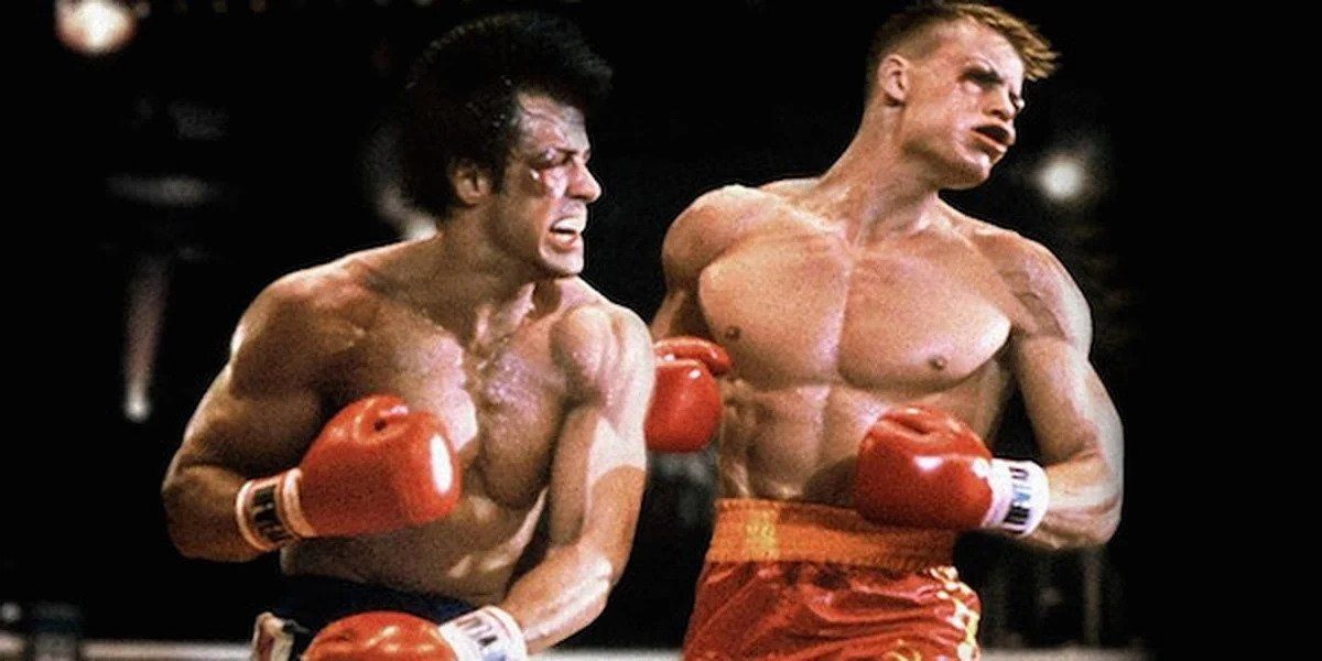 Sylvester Stallone punching Dolph Lundgren in a still from Rocky IV