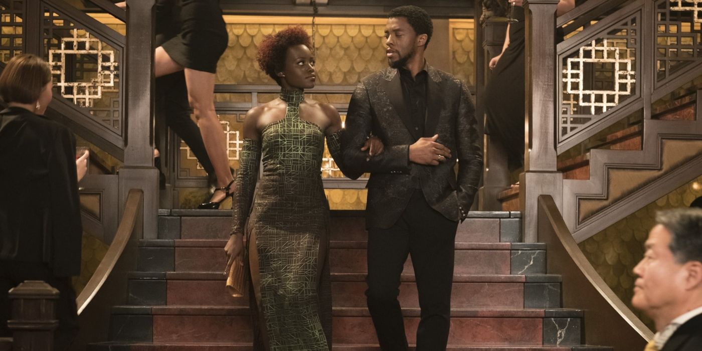 T'Challa and Nakia walking together at the club in Black Panther
