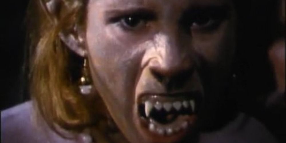 Family Reunion episode of Tales From the Darkside with woman with vampire teeth