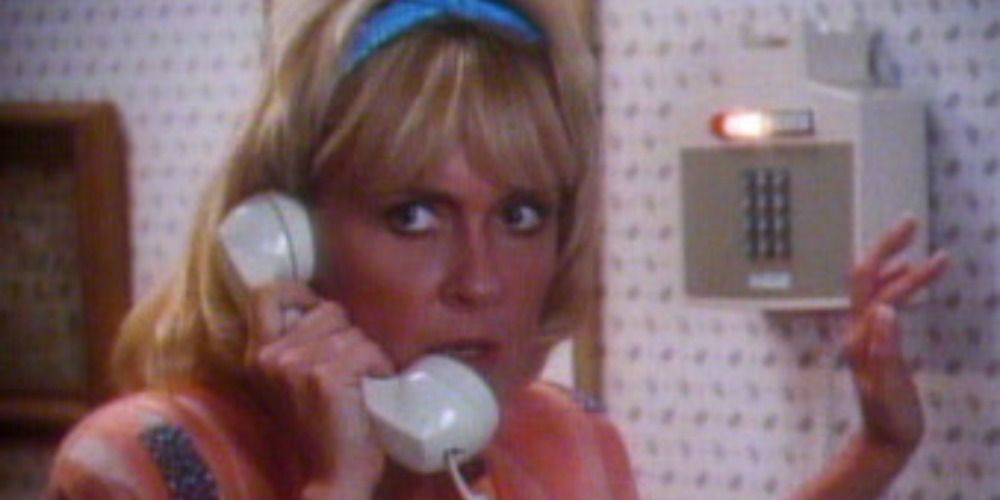 Woman on the phone, looking frightened in Sorry, Right Number episode of Tales From the Darkside.