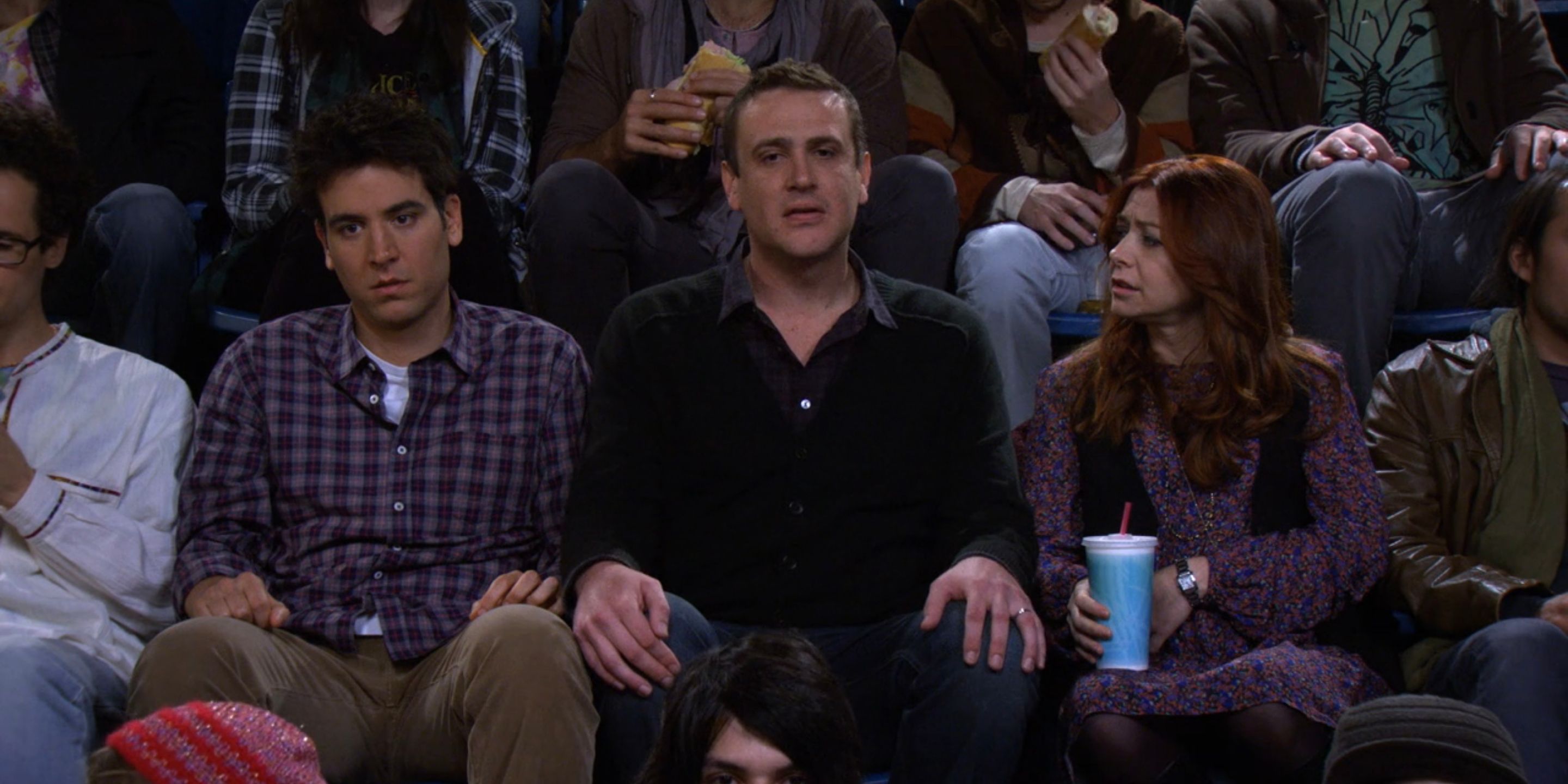 Ted and Marshall get high at a concert in How I Met Your Mother