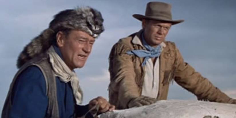 John Wayne wearing a coonskin cap in The Alamo