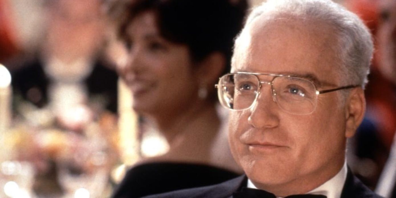 Richard Dreyfuss at dinner event looking off camera in The American President.