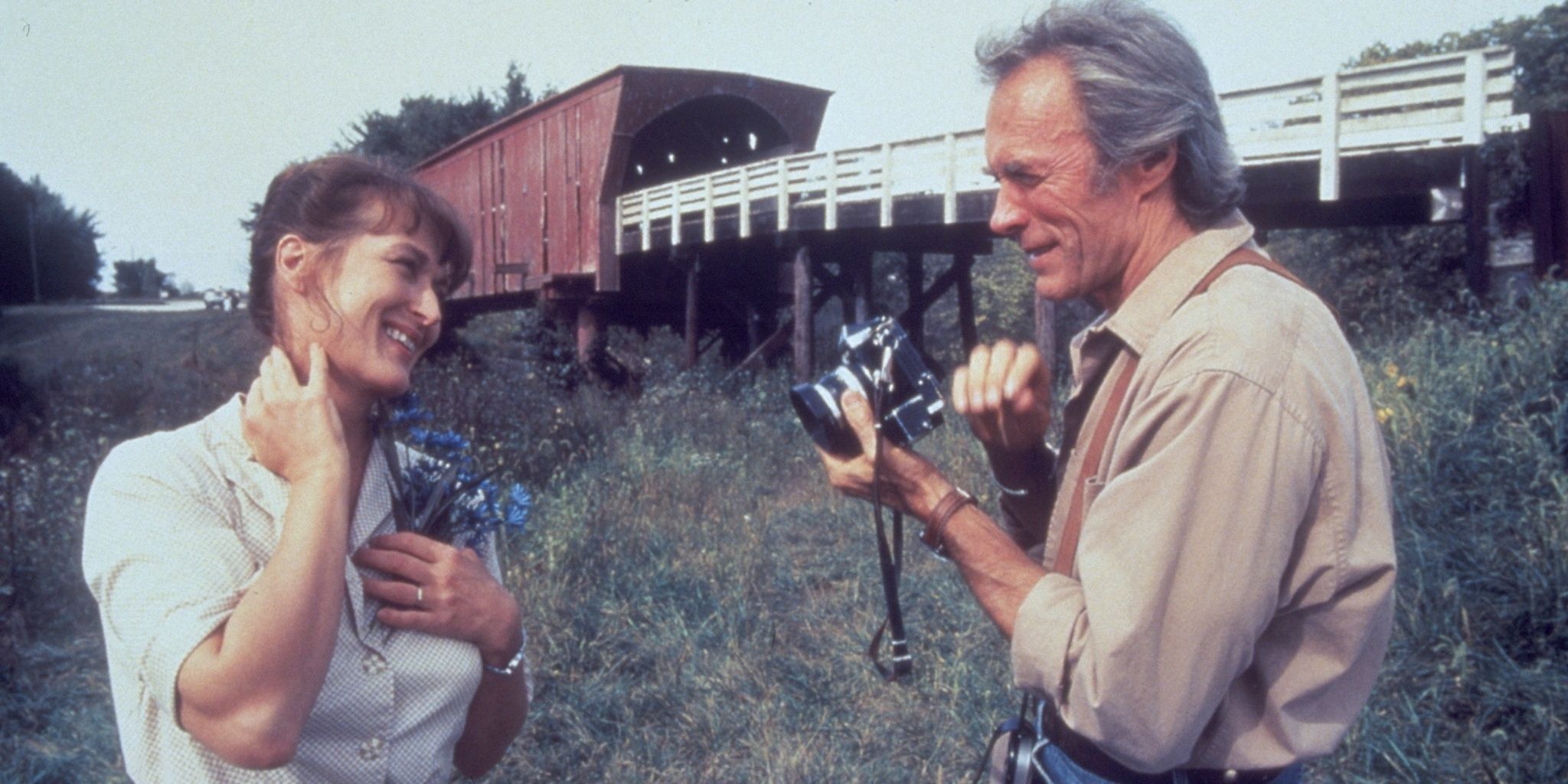 Clint Eastwood taking a picture of Meryl Streep in The Bridges Of Madison County