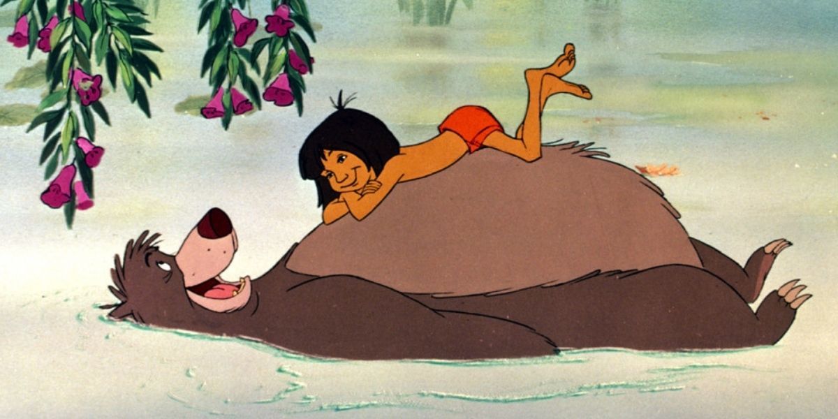 Mowgli lying on Baloo's stomach in the river