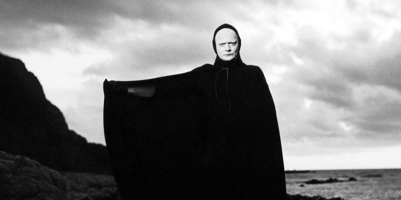 A man in a black hooded cloak in The Seventh Seal (1957)