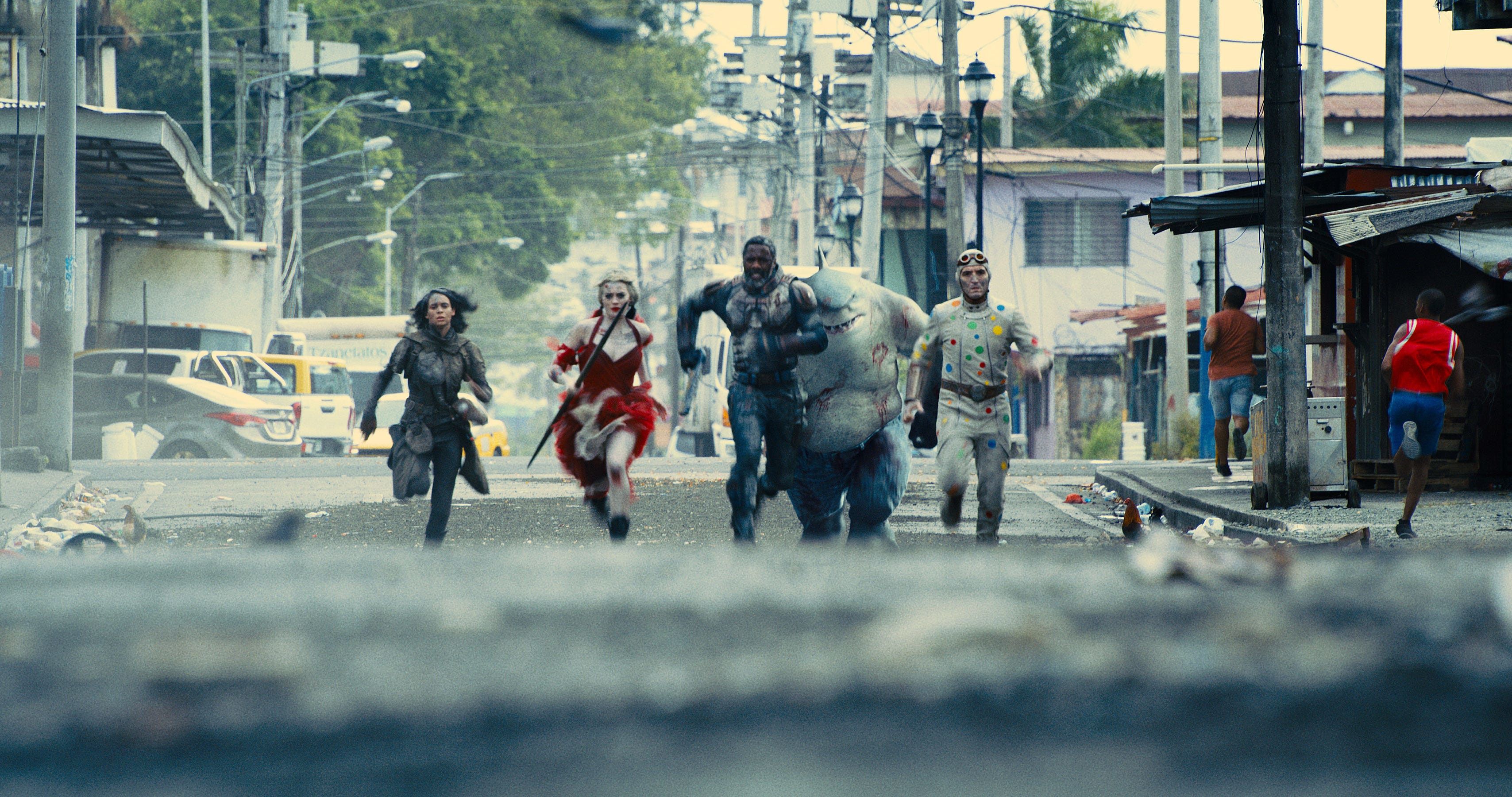 The Suicide Squad Margot Robbie Idris Elba Running