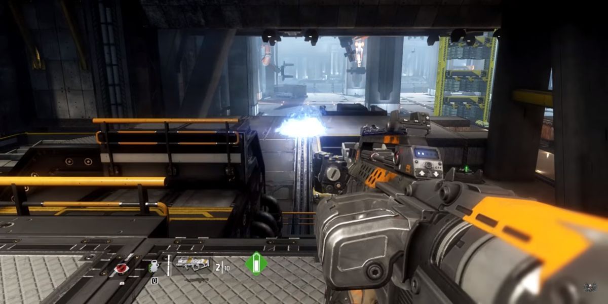 The player pointing a gun at the floor in Titanfall 2 
