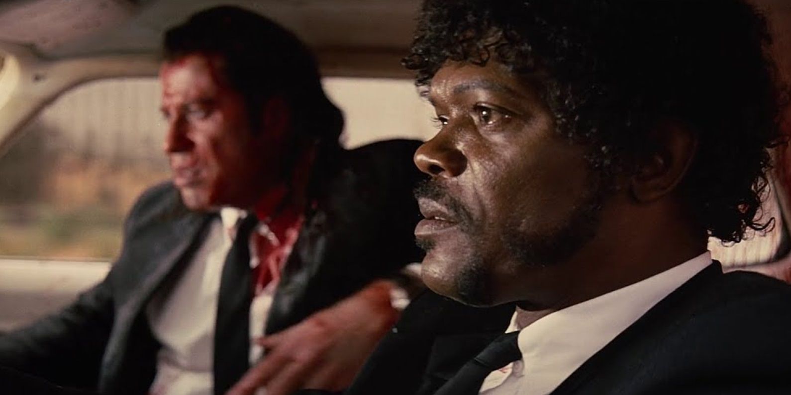 Vincent and Jules covered in blood in Pulp Fiction.