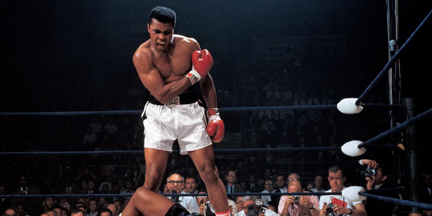 Whats My Name Muhammad Ali: Ali standing victorious in the ring