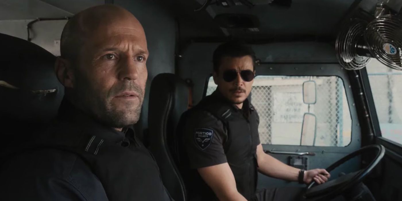 Jason Statham and Josh Hartnett in an armored truck in Wrath of Man.