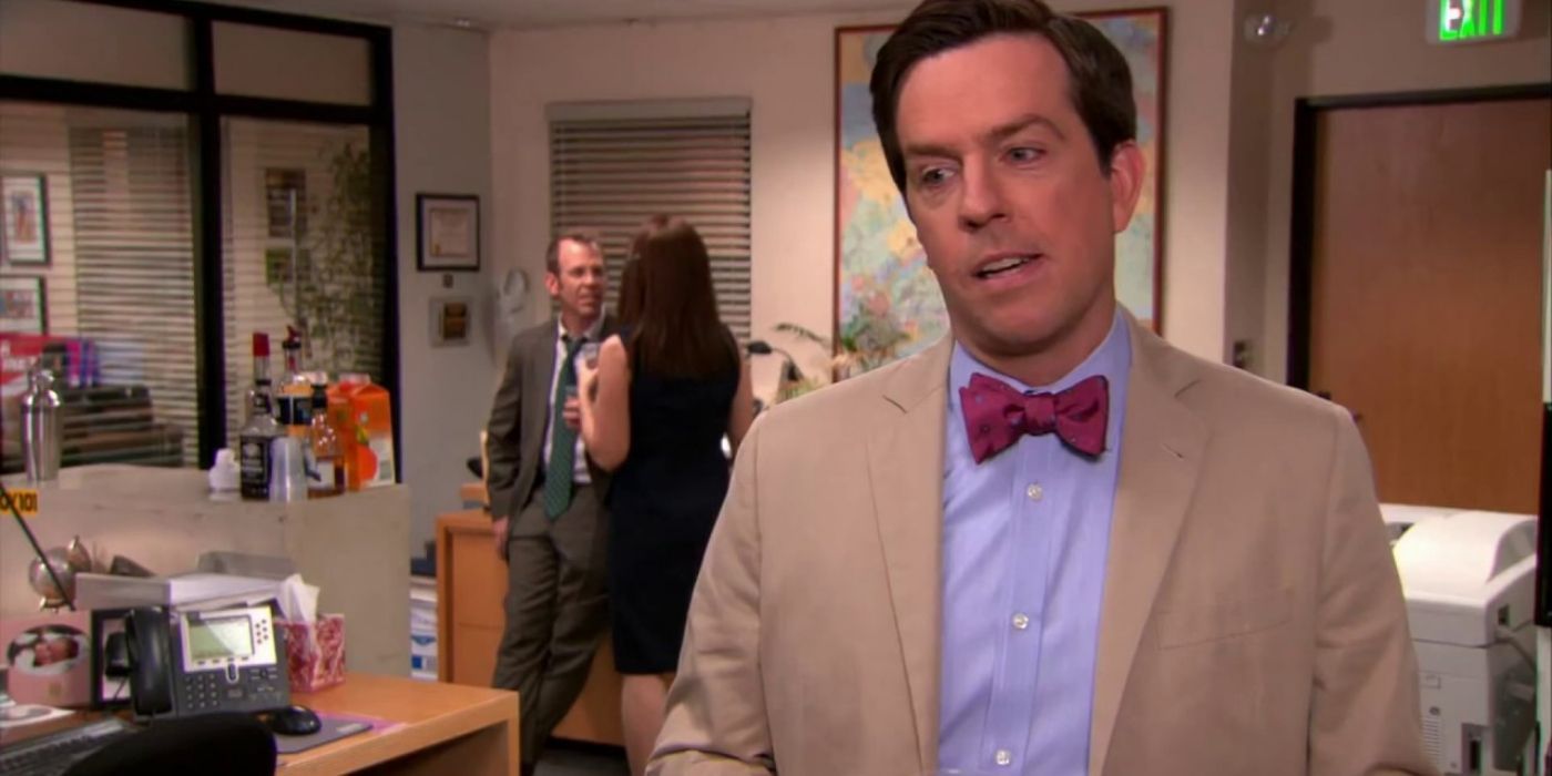 Andy talking to the cameras in a bowtie in The Office finale