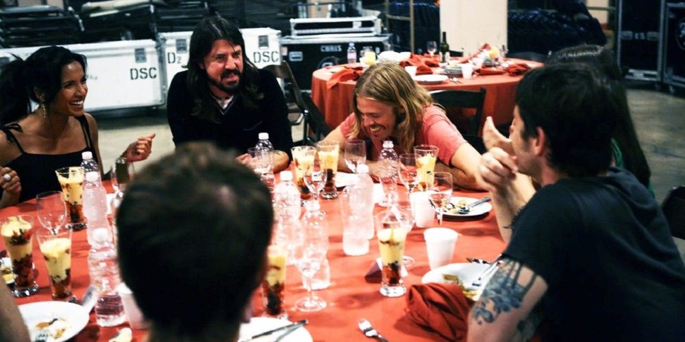Foo Fighters sitting around a table on Top Chef
