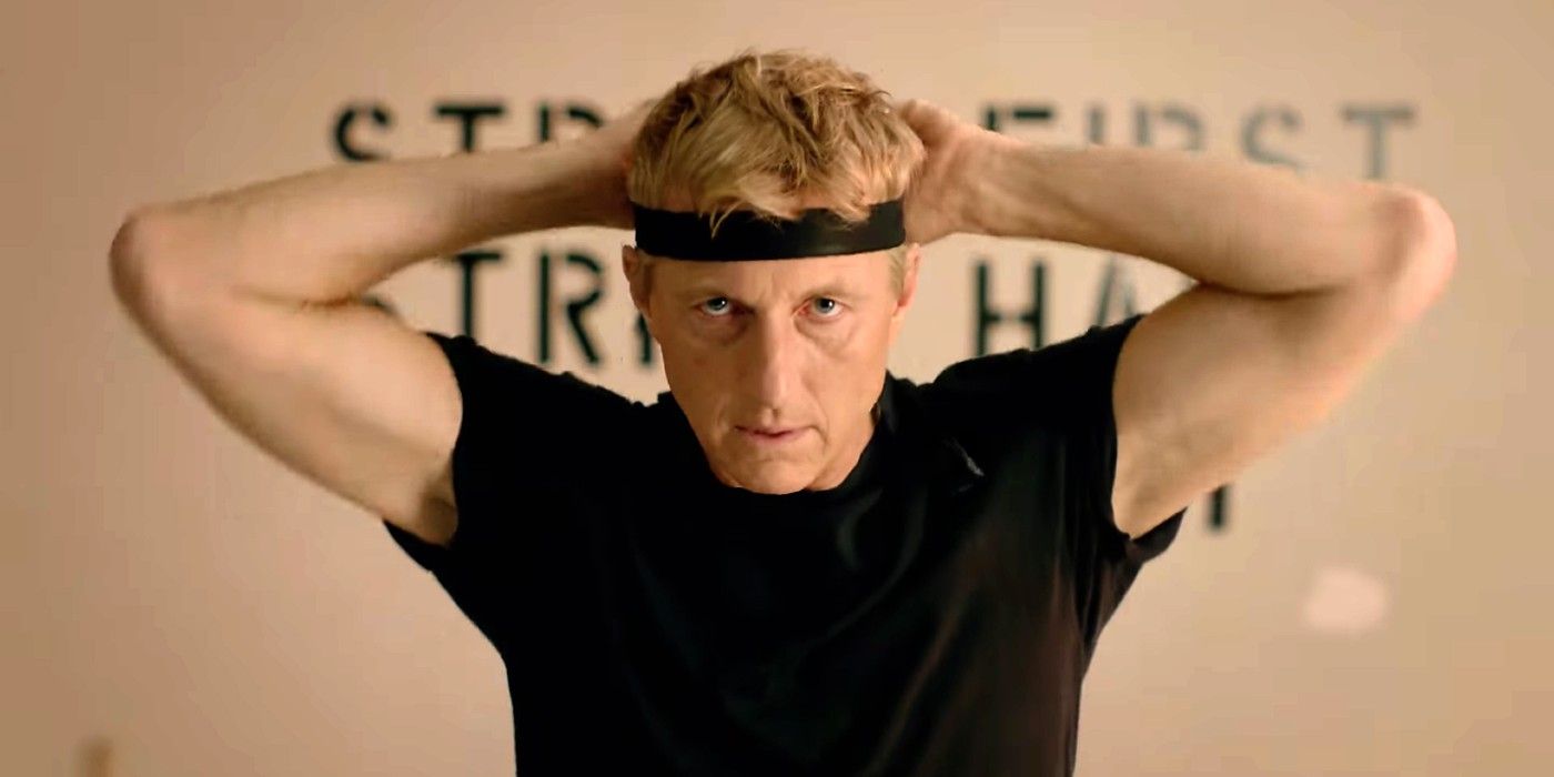 Johnny with his hands behind his head in Cobra Kai
