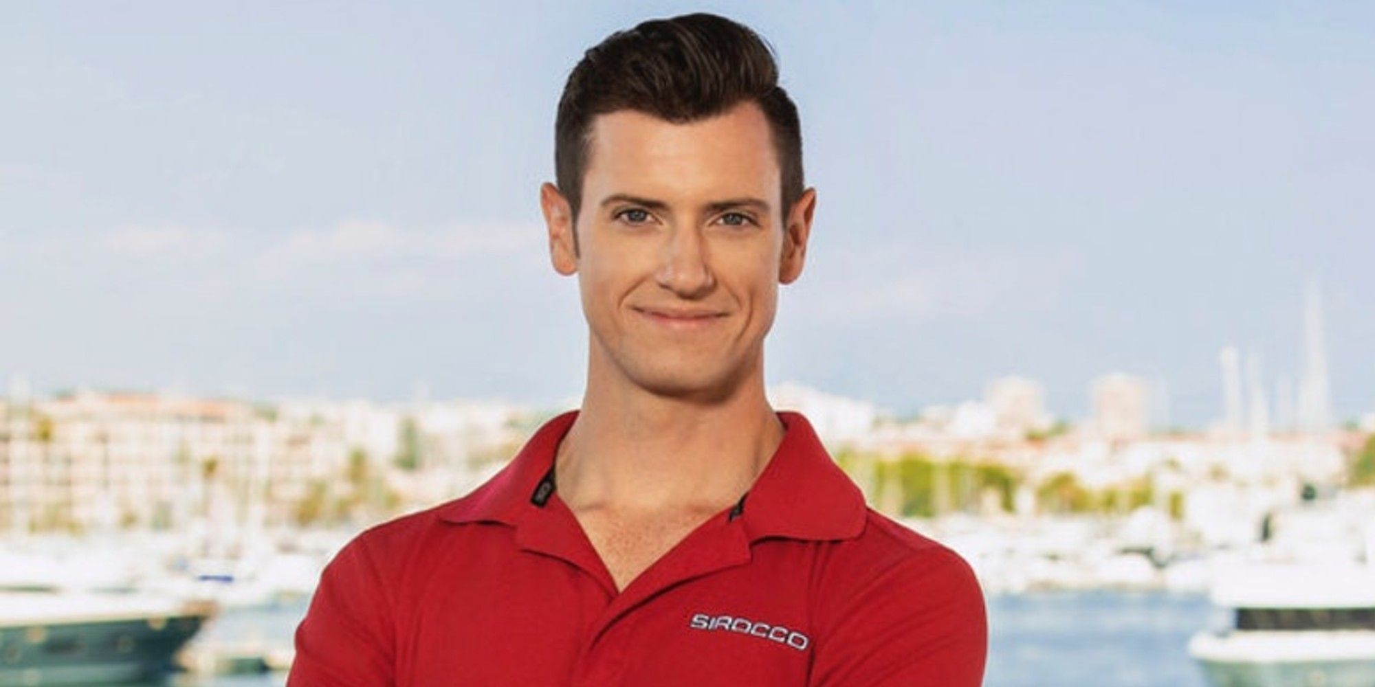 colin macy-o'toole wearing red shirt in promo shot at marina