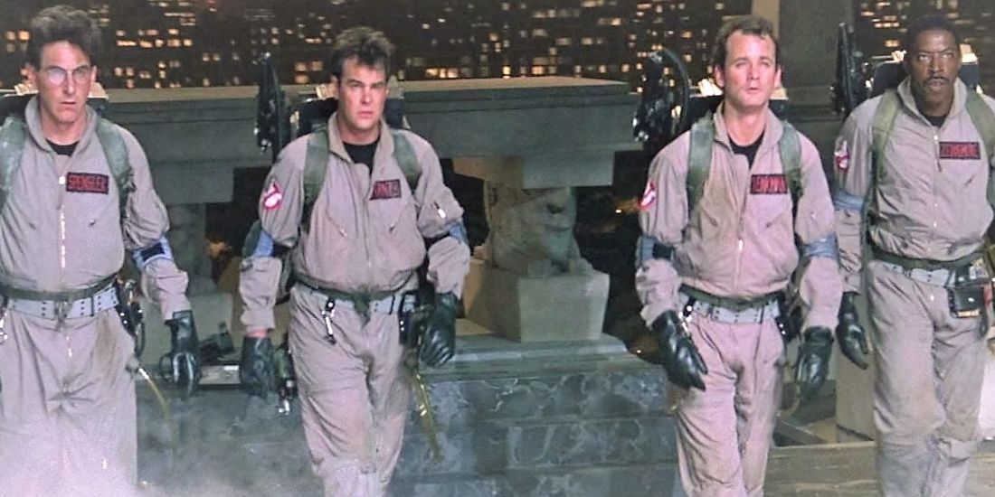 The Ghostbusters lined up on the rooftop in the original movie