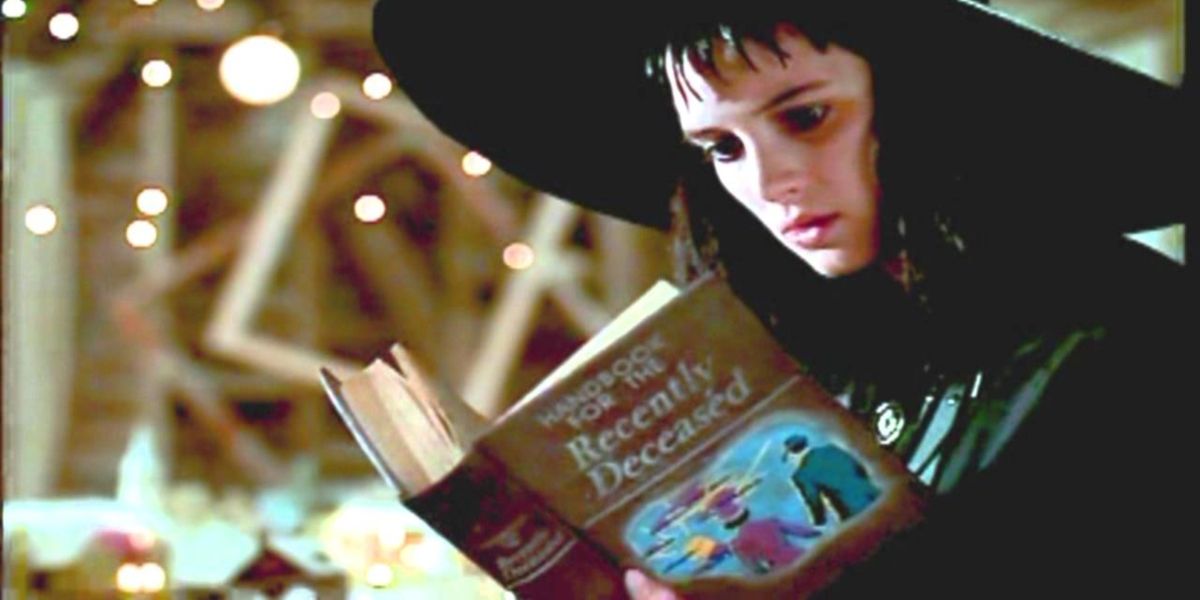 Lydia Deetz reading The Handbook for the Recently Deceased from Beetlejuice