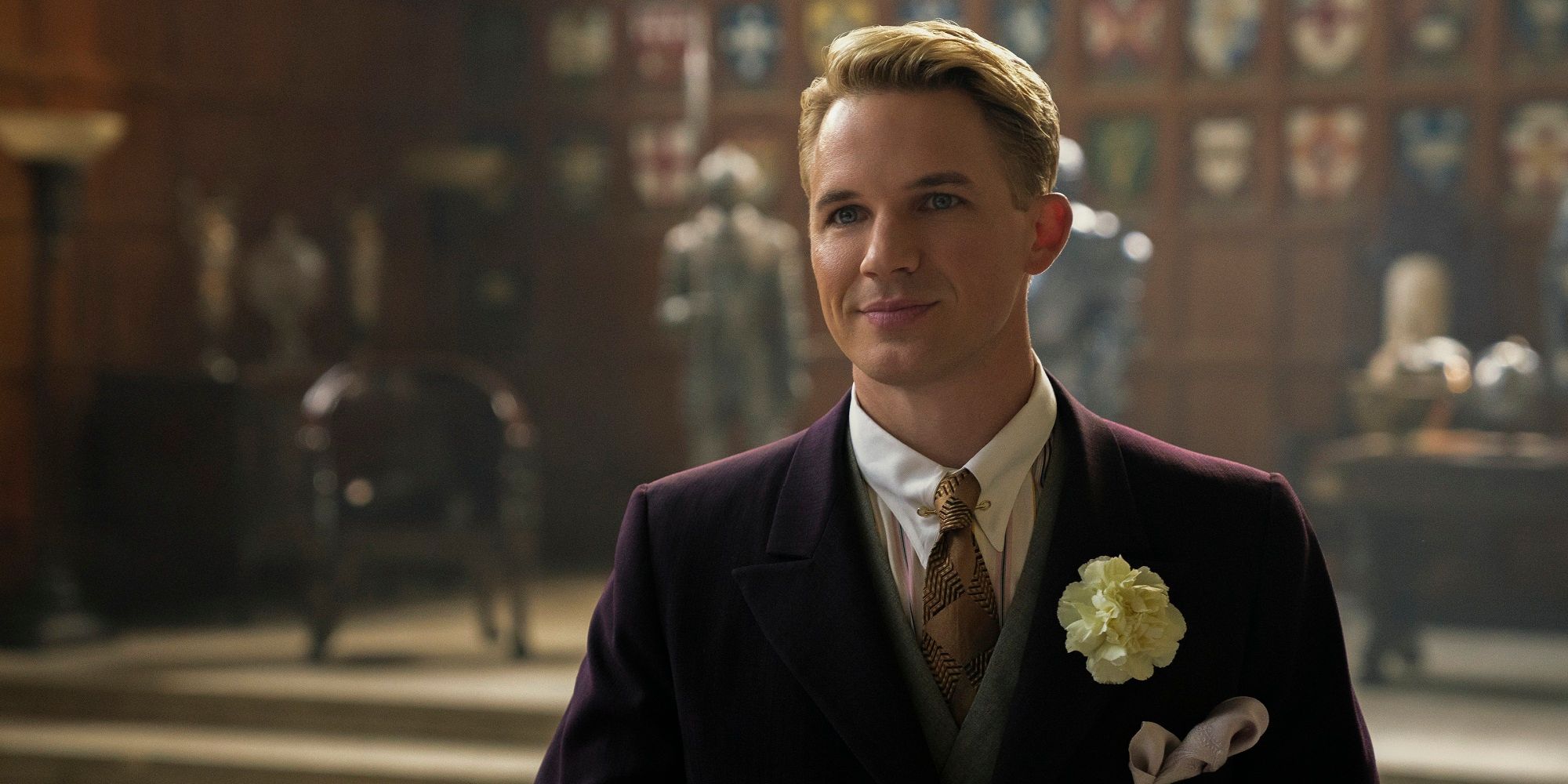Matt Lanter wears a suit and tie in Jupiter's Legacy.