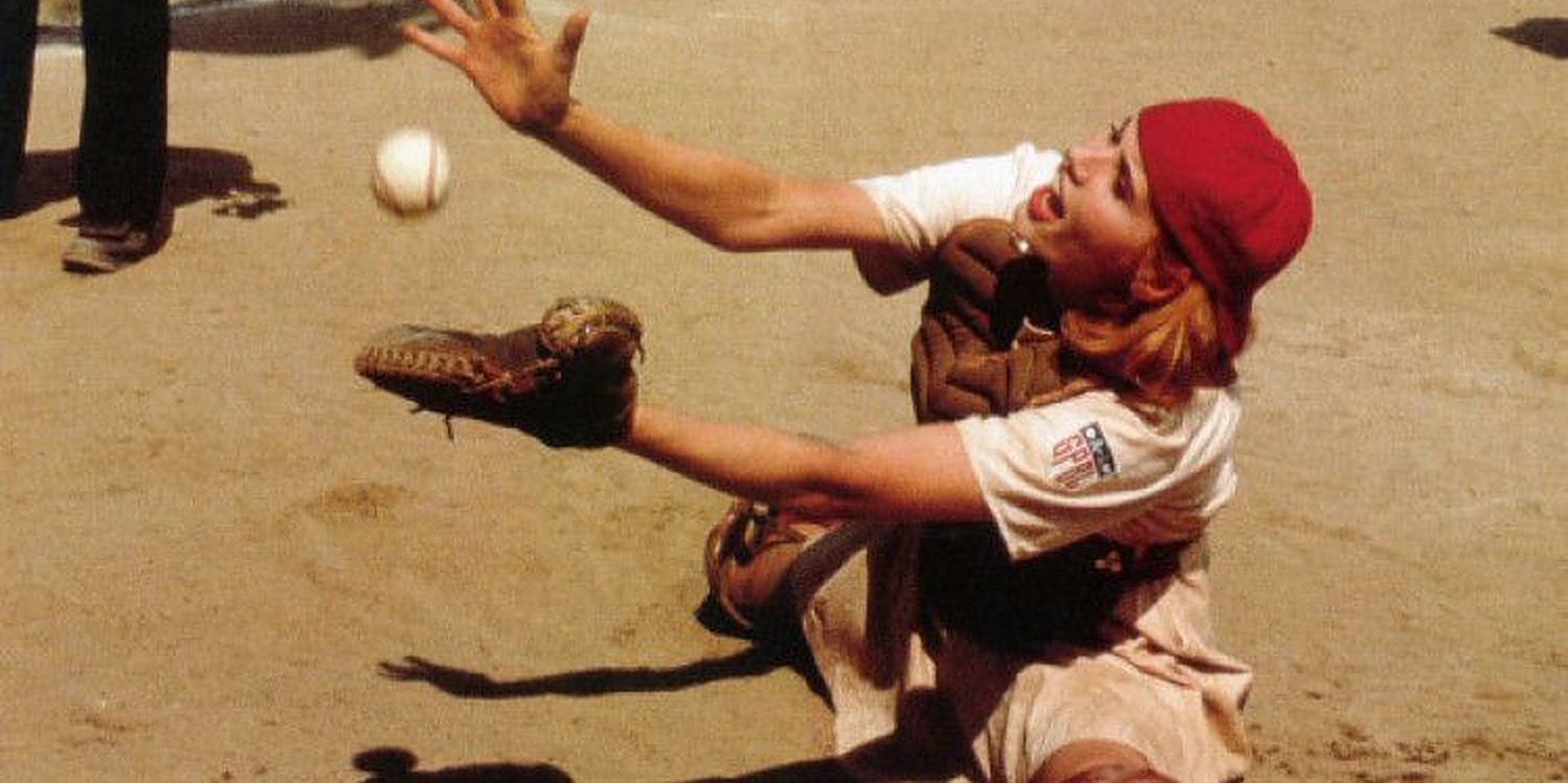 Dottie catches baseball in a split in movie A League of Their Own