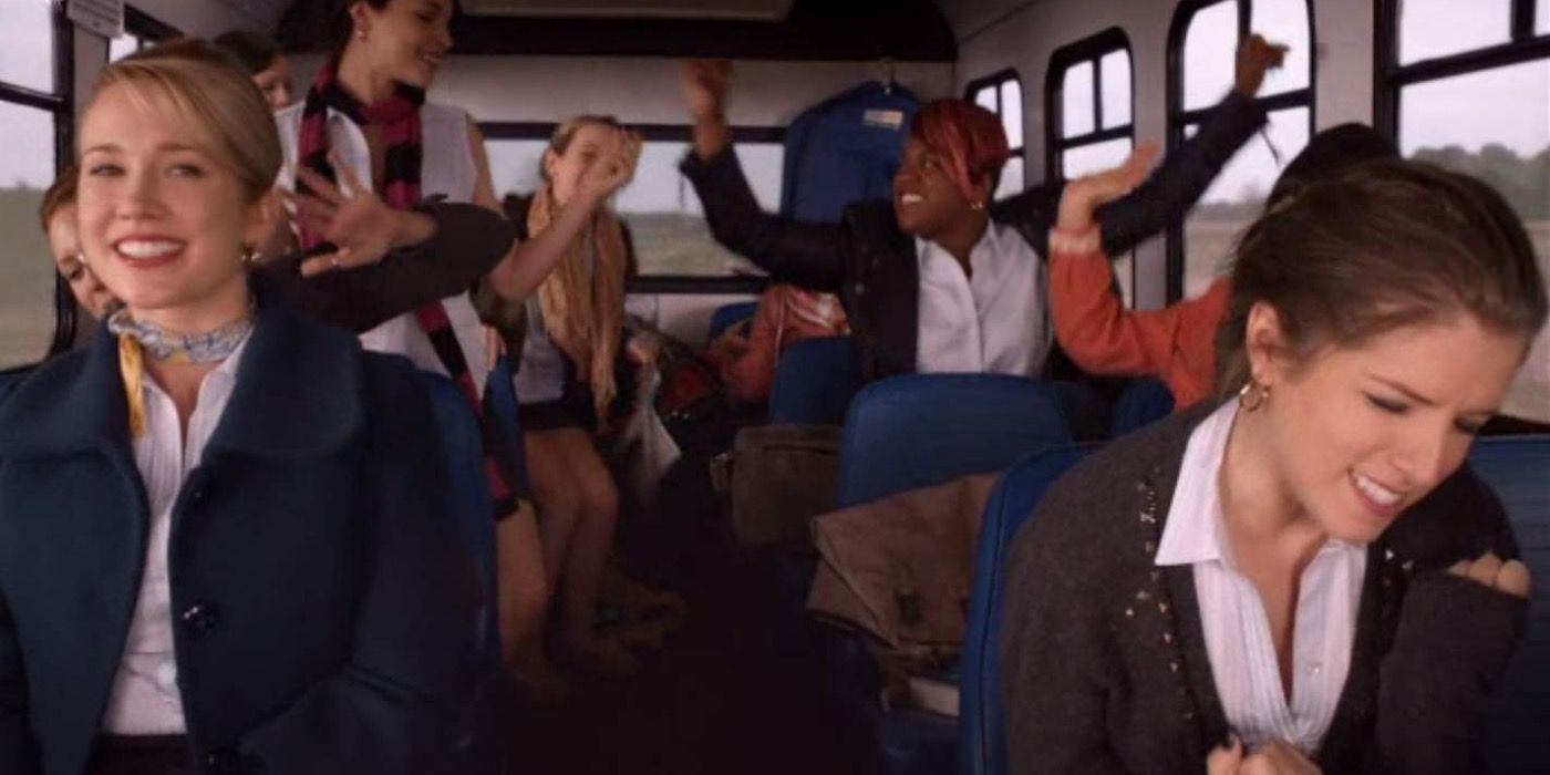 The Barden Bellas singing 'Party in the USA' on a bus