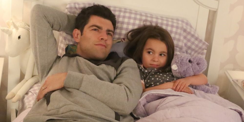Schmidt and Ruth laying in bed
