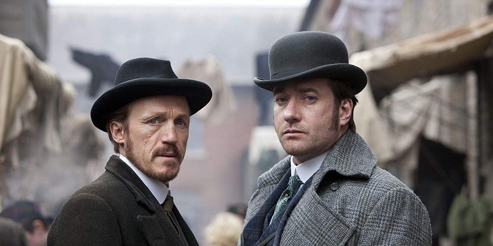 Edmund and his partner face camera in Ripper Street