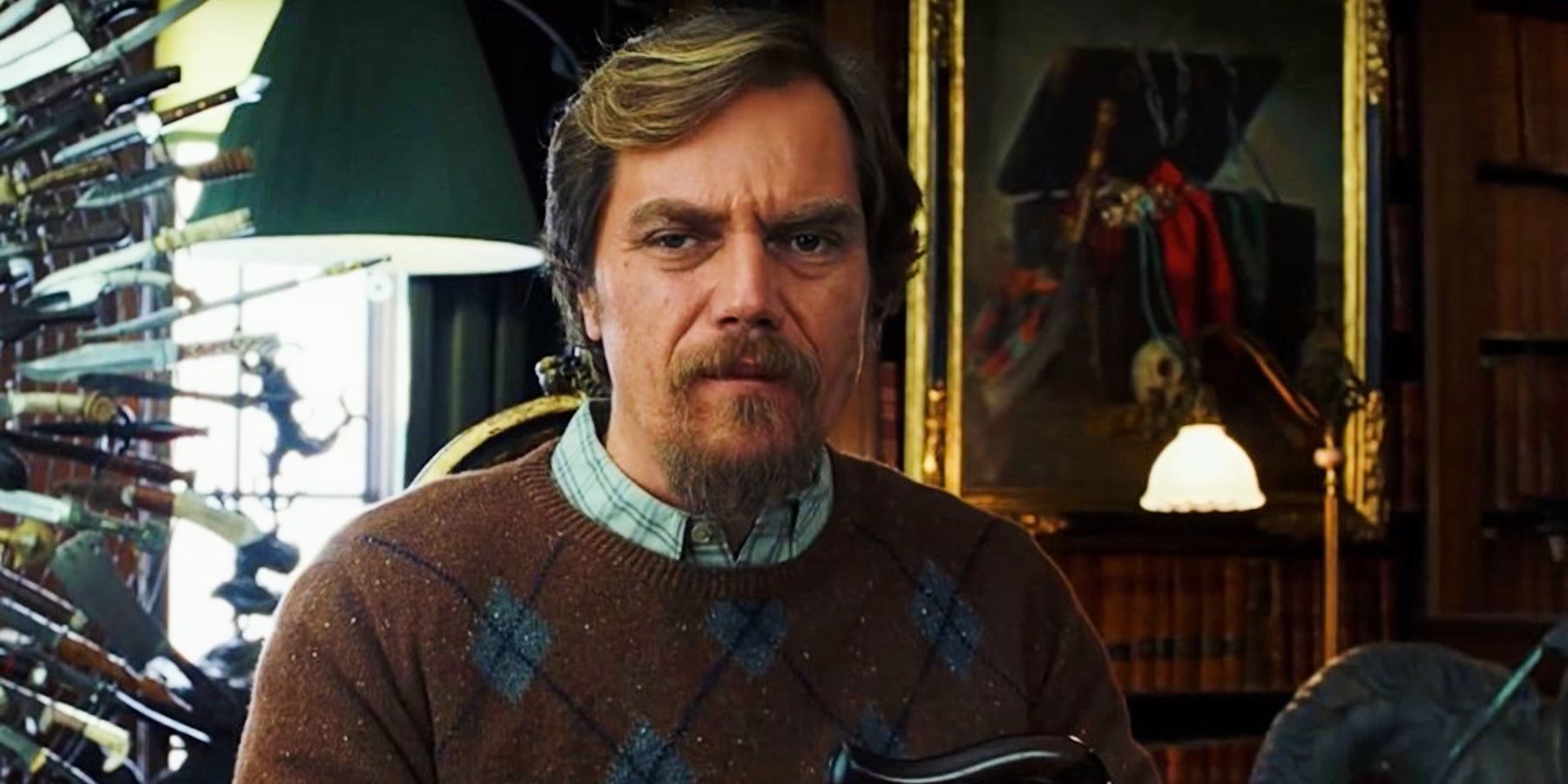 Michael Shannon in front of the knife chair in Knives Out