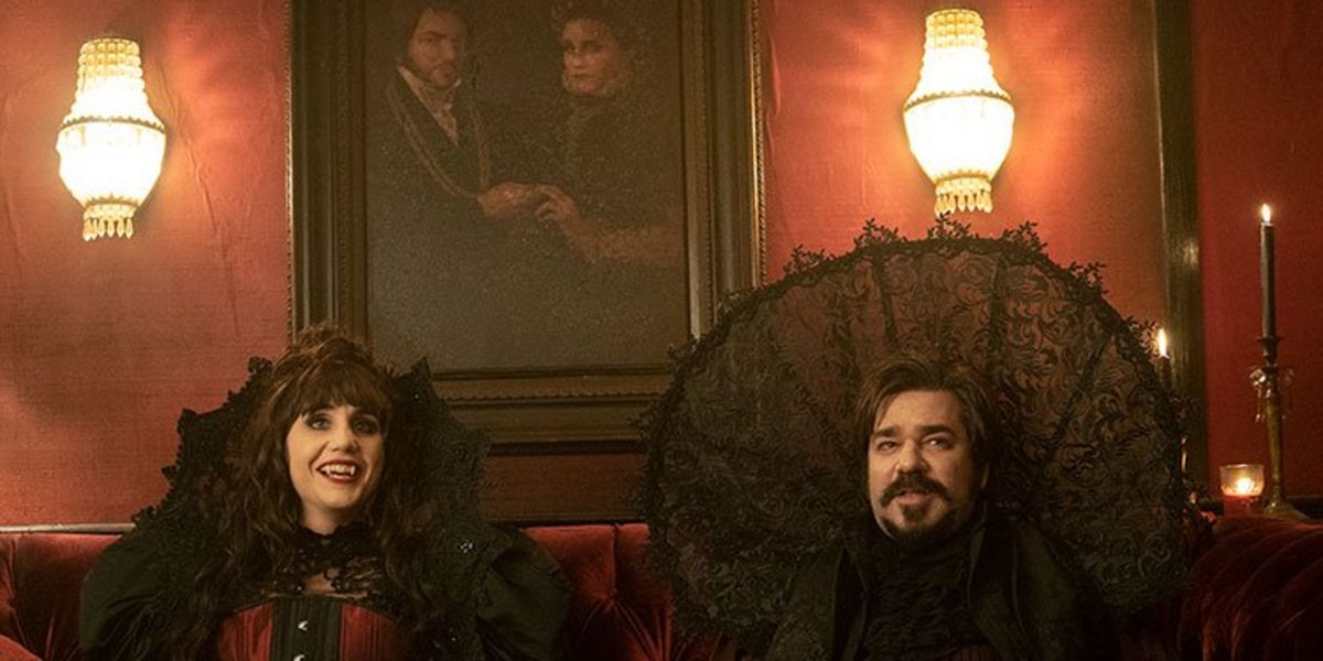 Laszlo and Nadja wearing giant lace collars in What We Do In The Shadows