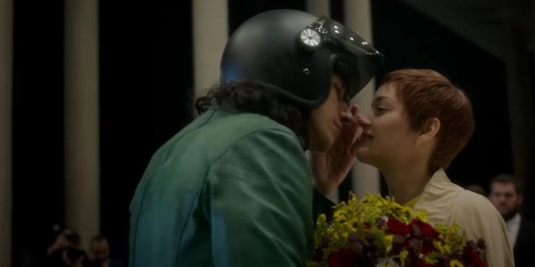 Adam Driver and Marion Cotillard about to kiss in Annette
