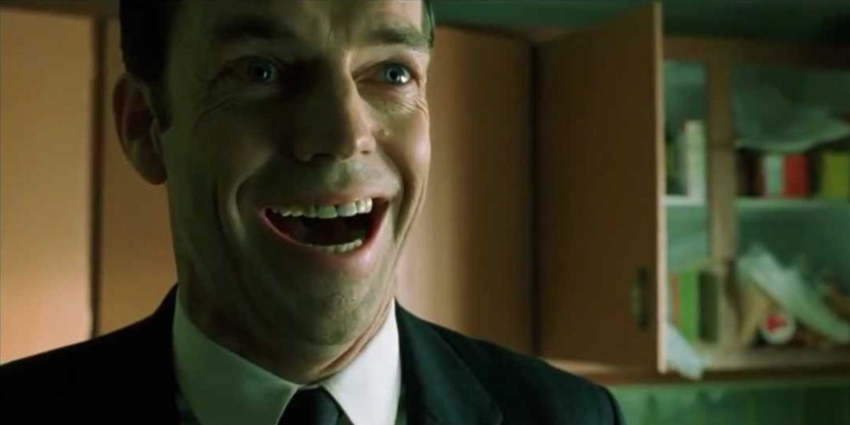Agent Smith laughing after becoming the oracle in The Matrix Revolution