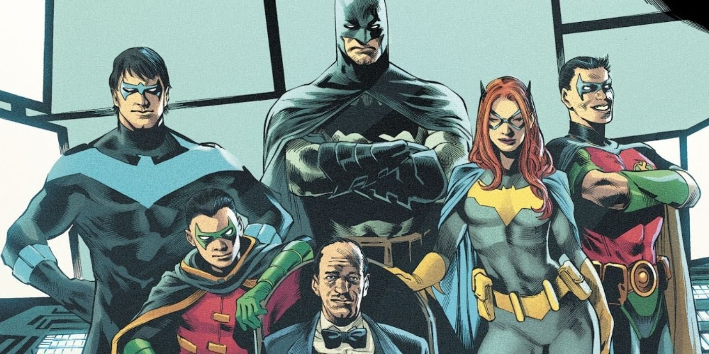 The Bat Family standing around Alfred