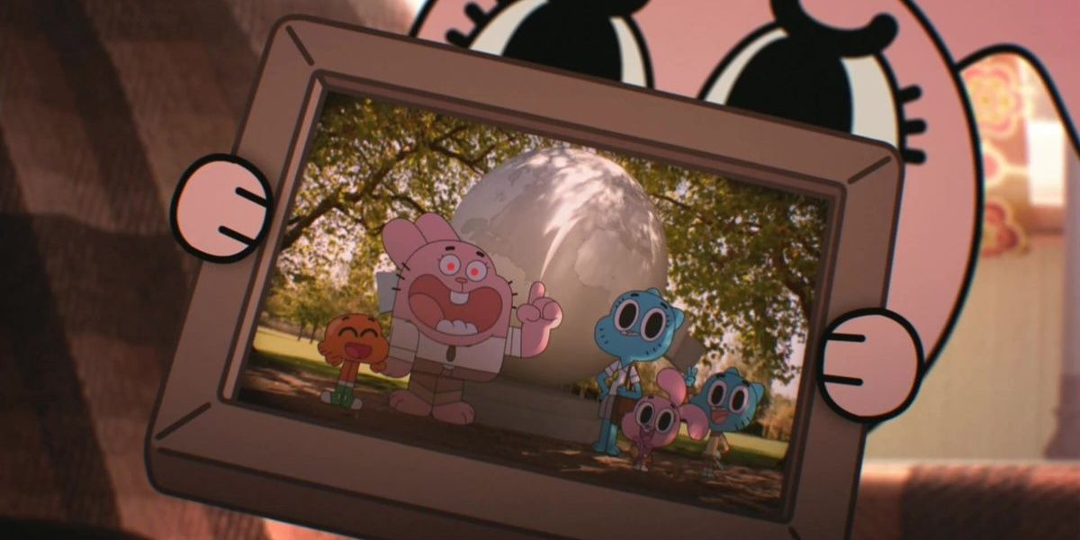 Anais Holds Up A Family Picture