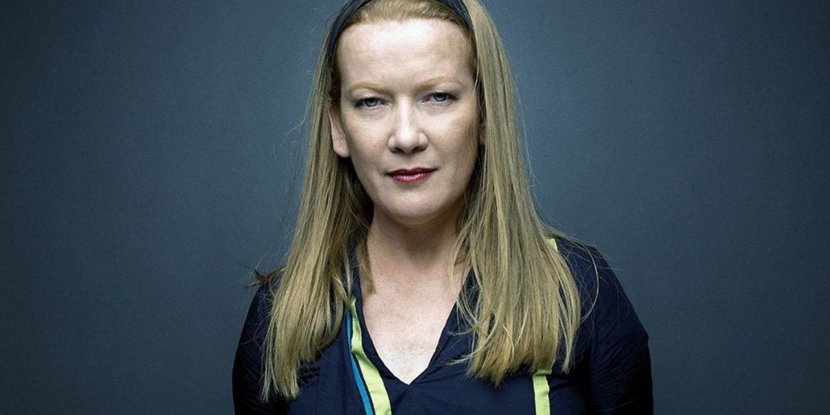 Andrea Arnold staring at the camera with a serious expression on her face