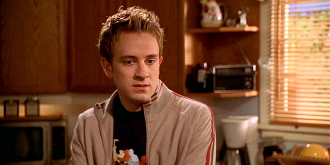 Andrew standing in the kitchen in Buffy.
