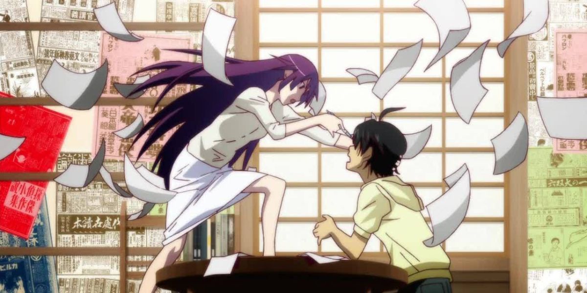 Senjougahara threatens to stave Araragi in the face during a romantic scene.