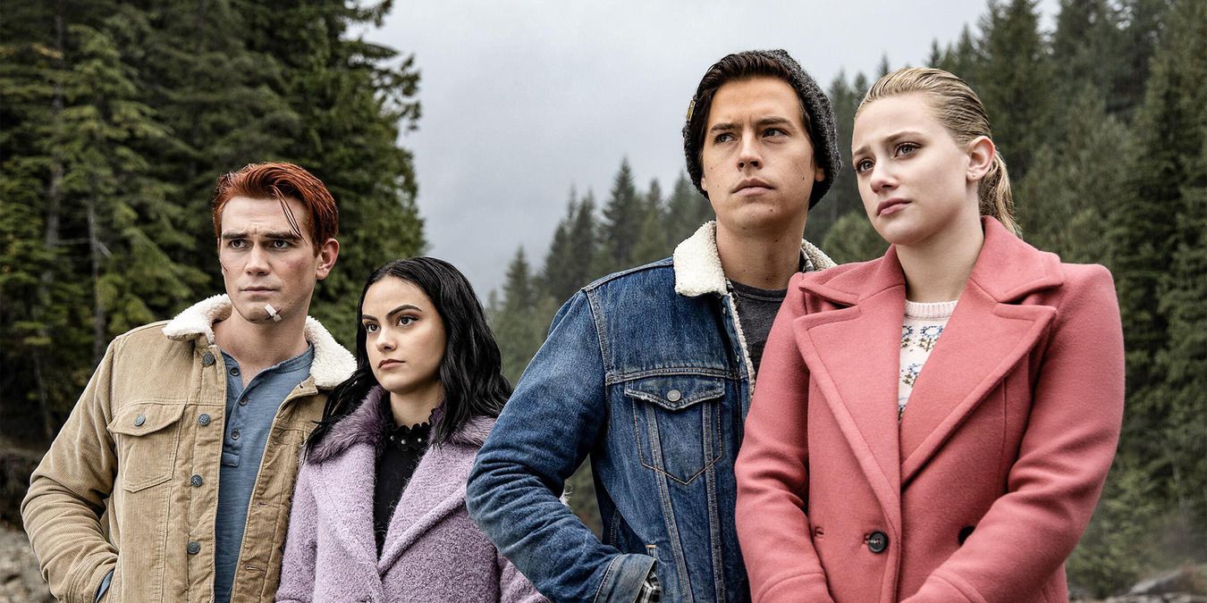 Archie Veronica Jughead and Betty standing by the river in Riverdale