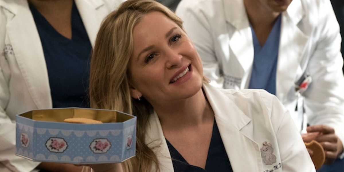 Arizona holding her weed cookies and smiling