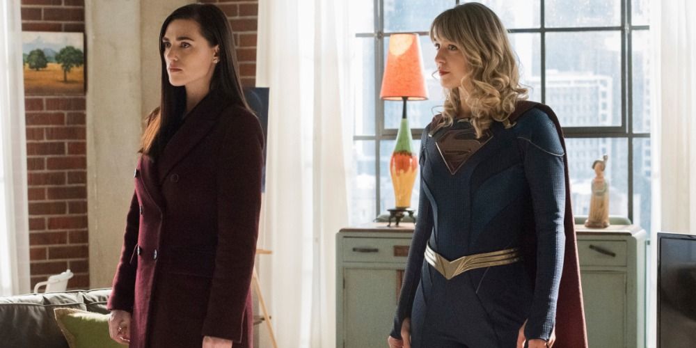 Supergirl and Lena Luthor stand in the apartment in Supergirl