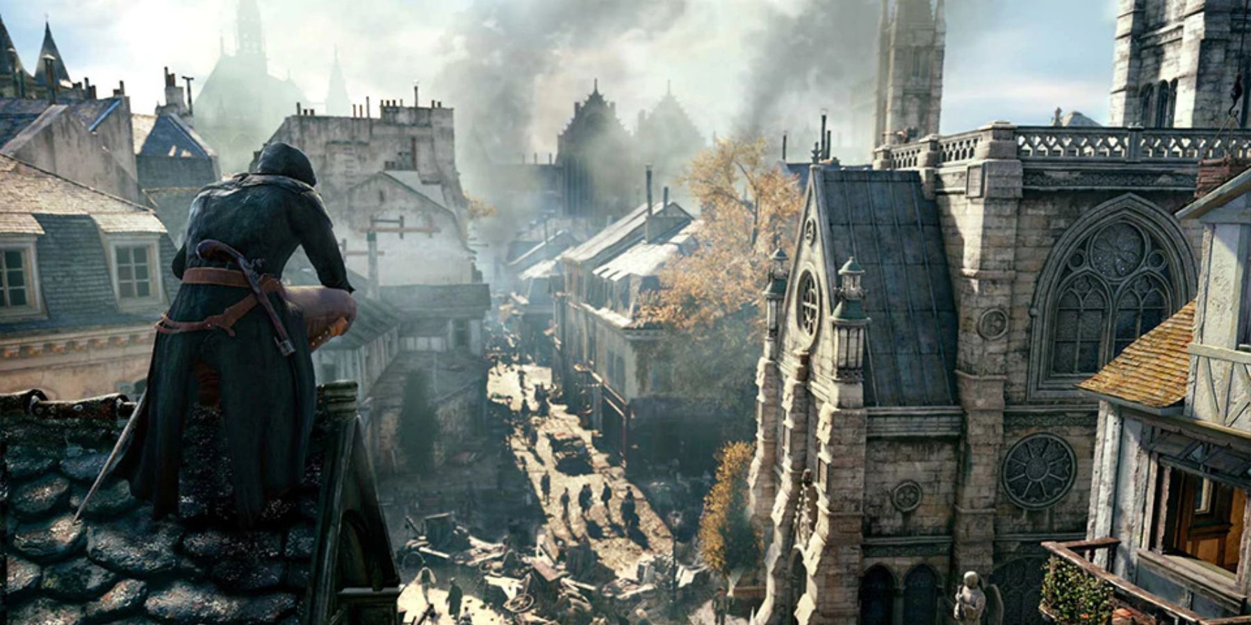 Arno on a roof overlooking Paris in Assassin's Creed Unity.